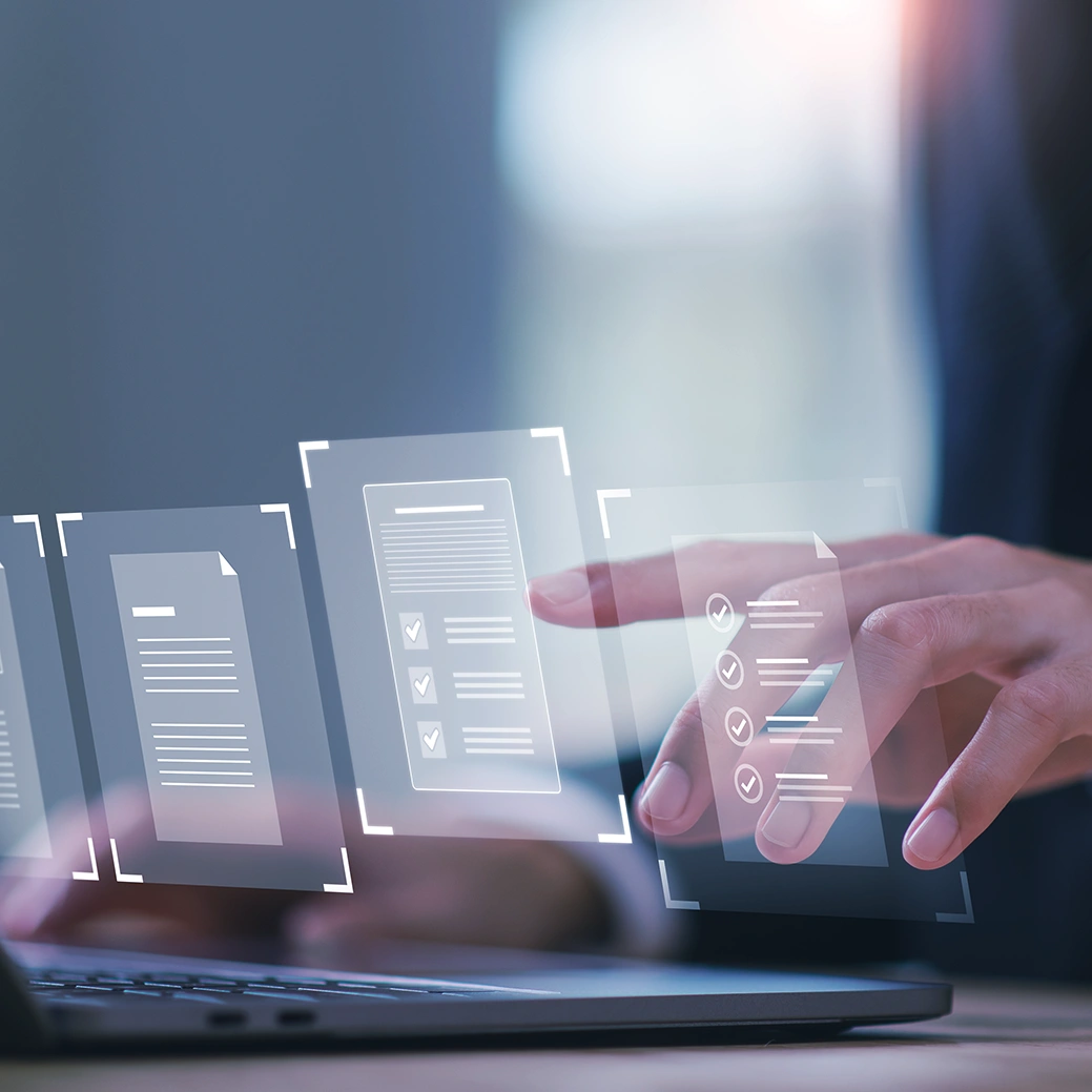 Compliance professional tapping hologram forms to depict electronic submission of export license applications