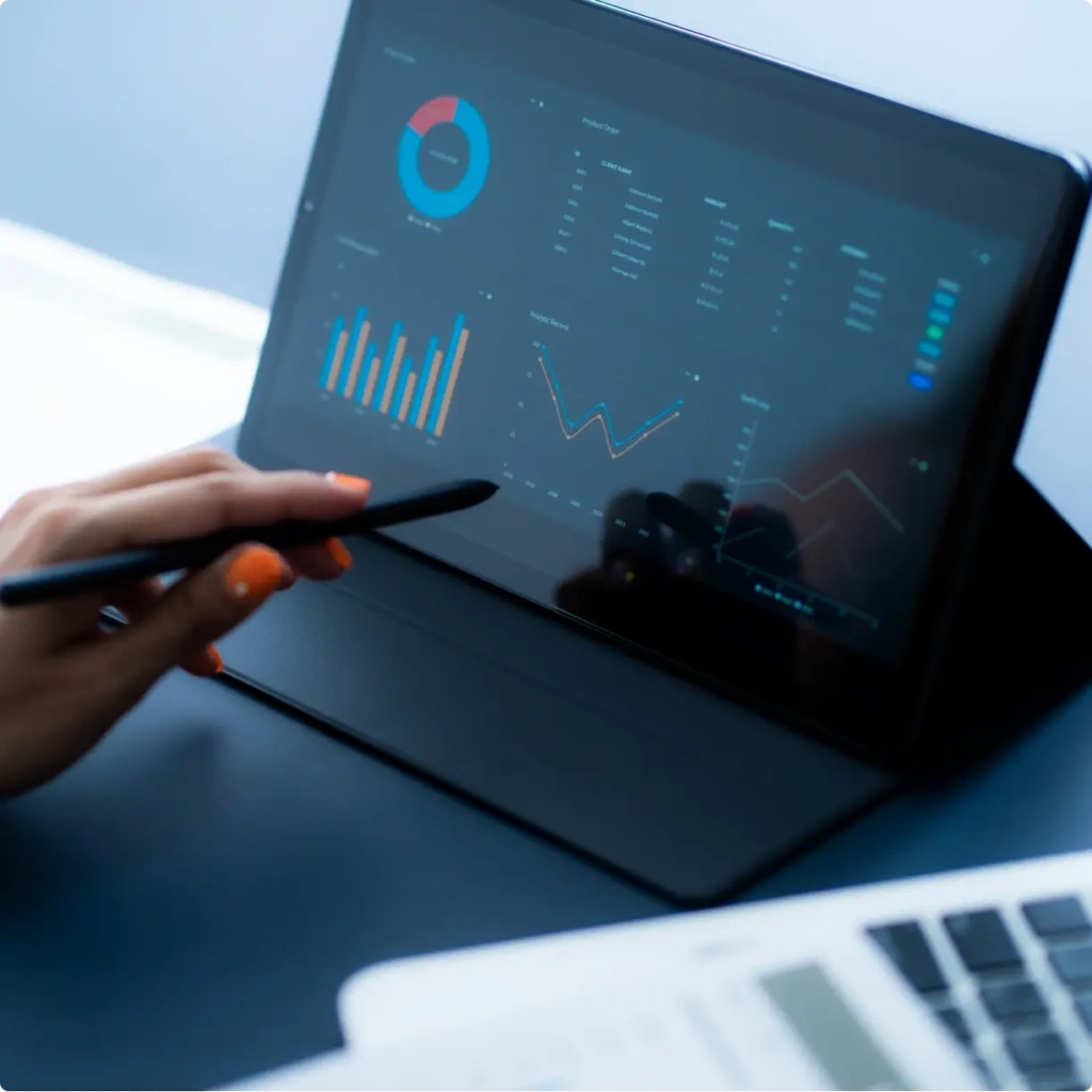 A businessperson analyzing the report of an integrated denied party screening in Hubspot.